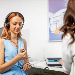 Woman taking a hearing test