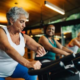 Group of friends taking a spin class together